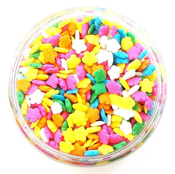 Mini Flower Sprinkles-Mini Flower shaped Quins can be used to decorate your cakes, cupcakes, cookies and brownies. 4 oz Container