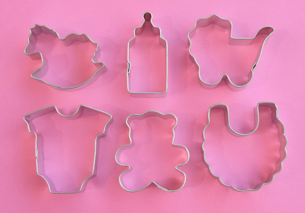 Baby Mini Cookie Cutter Set includes baby bib, baby bottle, carriage, baby bear, onesie, rocking horse.