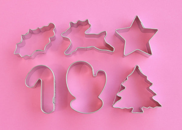 Holiday Fun Mini Cookie Cutter Set-Set includes mitten, candy cane, holly, tree, star, and reindeer.