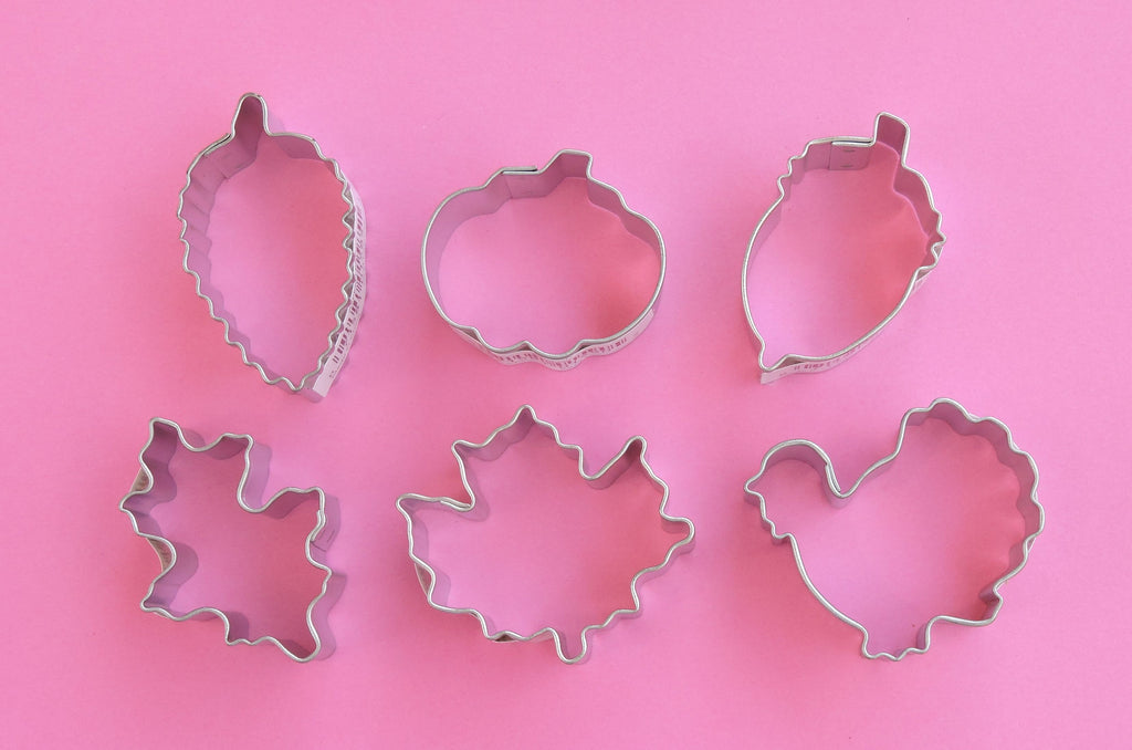 Thanksgiving Mini Cookie Cutter Set-Set includes turkey, maple leaf, oak leaf, pumpkin, acorn, and aspen leaf.